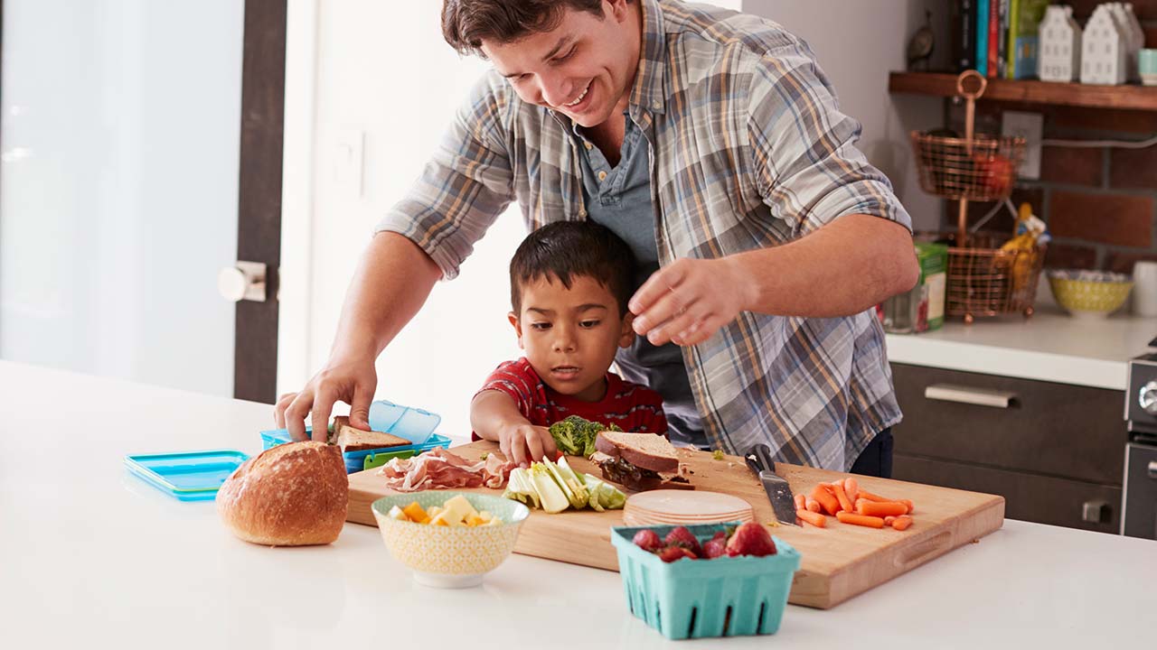 The children make a. Cooking with parents. Make lunch. Making lunch child.